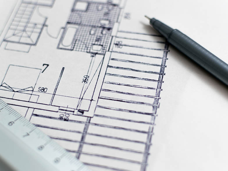house blueprint with pen