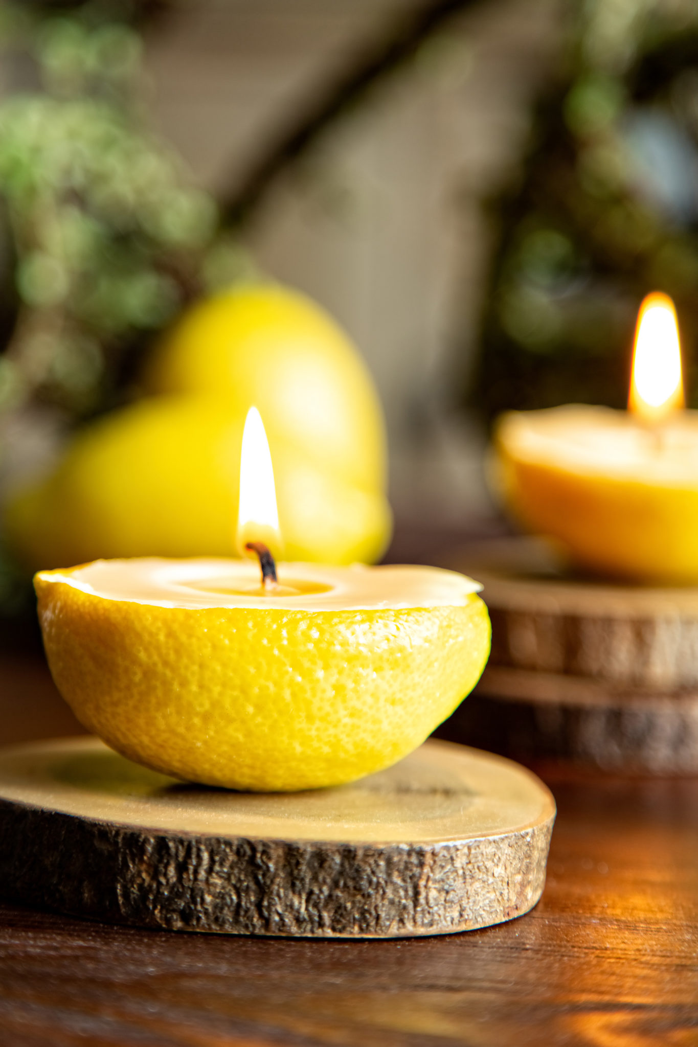 Lemon candles on wooden table