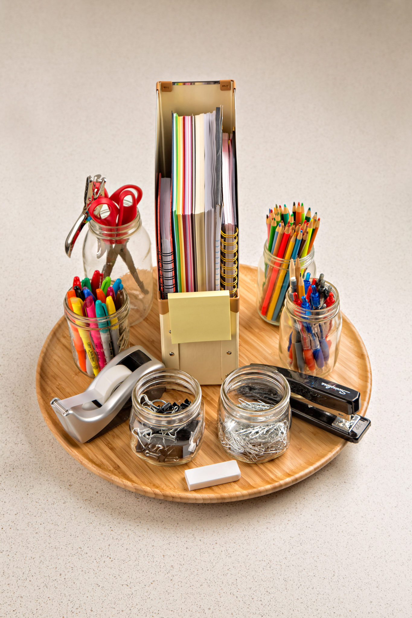Spinning table tray utilizing a lazy susan to organize school and desk supplies