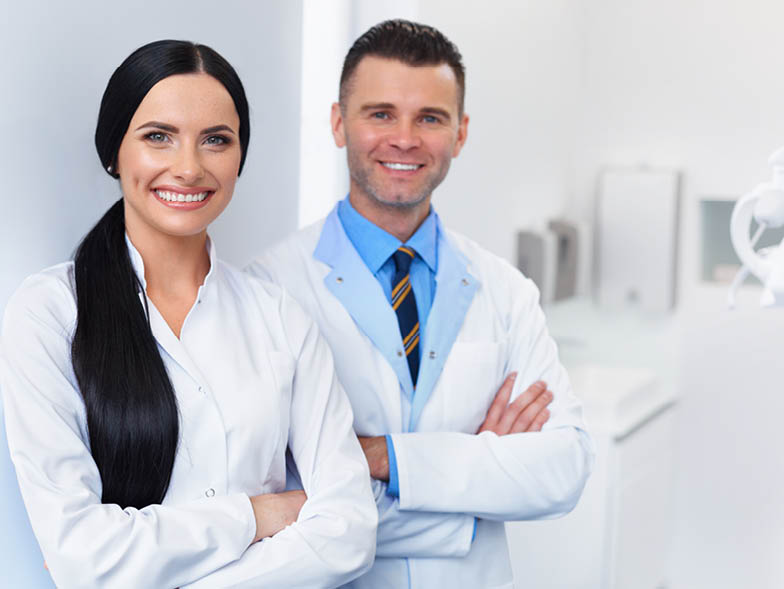 doctors standing in front of white wall