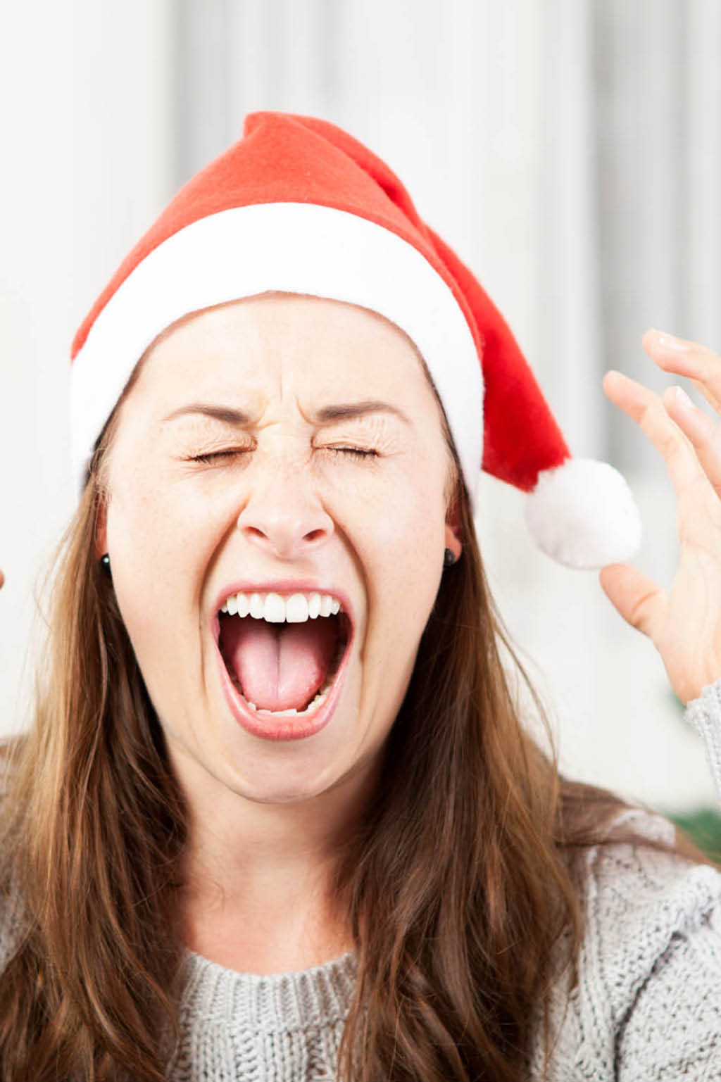 young girl screams because of bad christmas stress