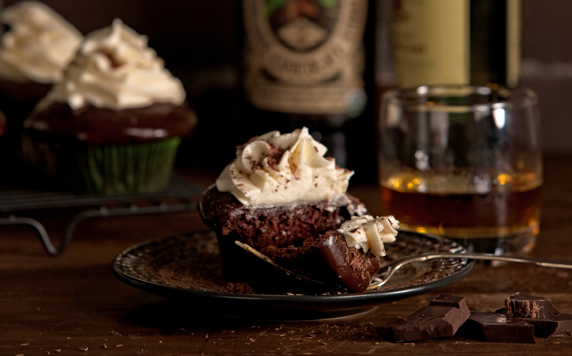 Chocolate Irish stout cupcakes with fork ready to take a bite