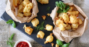 Garden herb cheese curds on slate