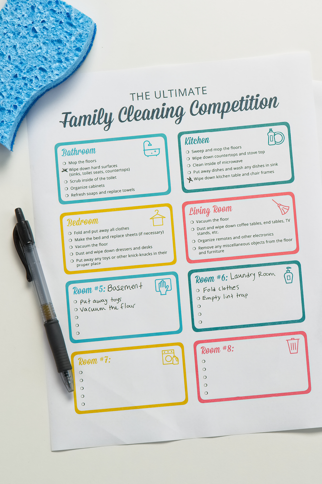 Printable cleaning competition papers on background with cleaning products around them
