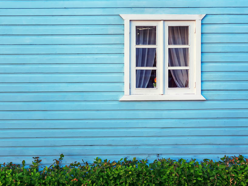 window on blue house