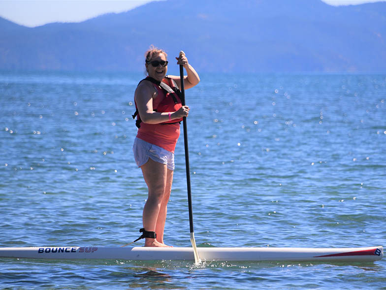 breast cancer survivor paddleboarding