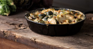 brussels sprouts au gratin in pan