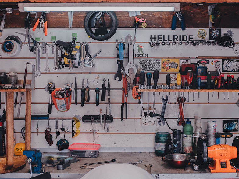 Set of tools against garage wall