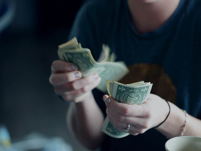 Woman counting out money