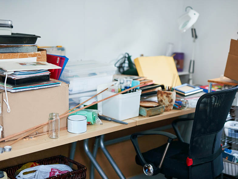 Extremely cluttered desk