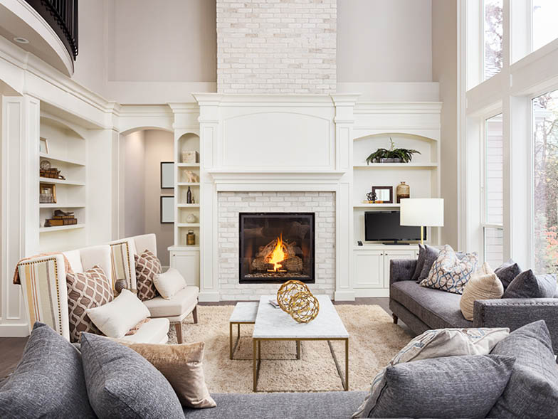 Living room with fireplace and muted color pallet