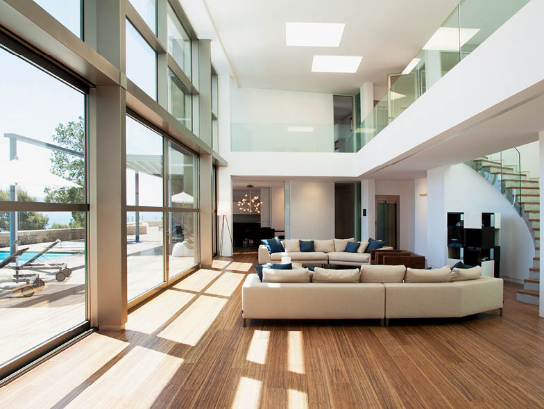 Large and airy living room with floor-to-ceiling windows