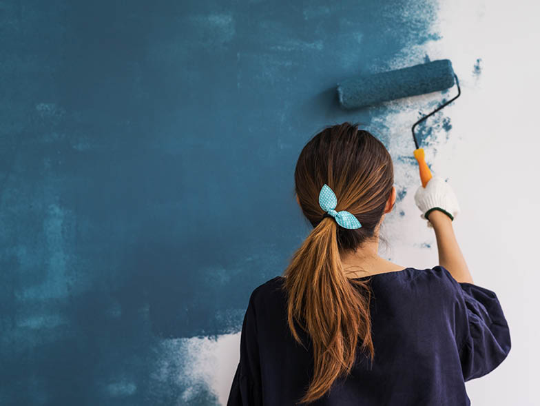 woman against wall painting, wall, paint, blue, setting paint, roller