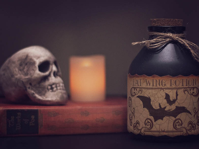 Skull, candle, and potion jar