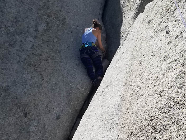 climbing between two rocks