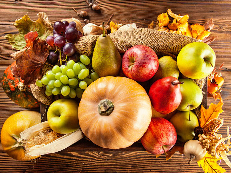 Basket of healthy autumn fruits and vegetables