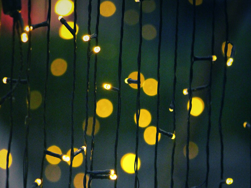 Yellow lights hanging vertically