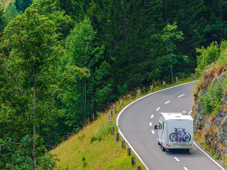 RV driving on winding road