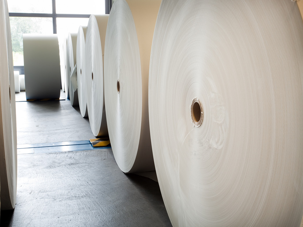 Large rolls of recycled paper
