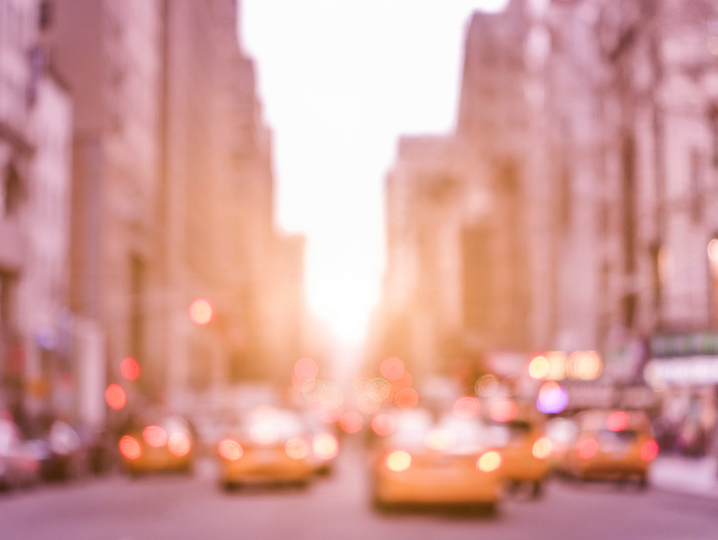 Blurred picture of cabs and buildings in New York City