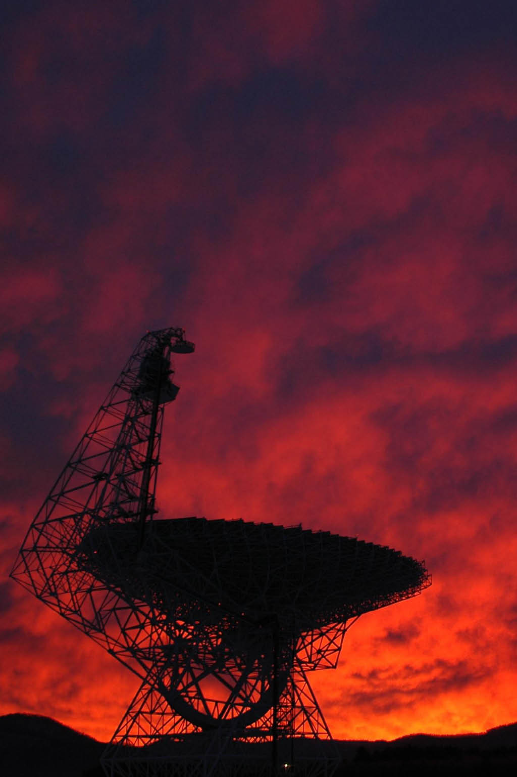 Green Bank telescope in front of colorful sunset