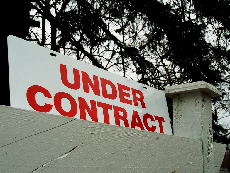 under contract sign