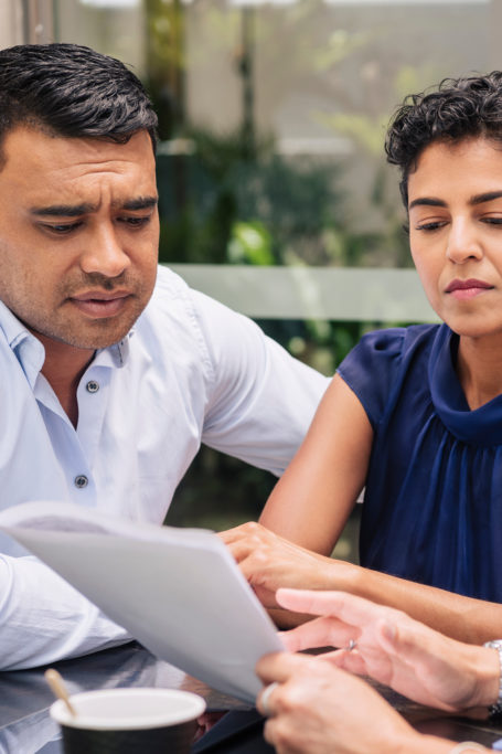couple looking at paperwork