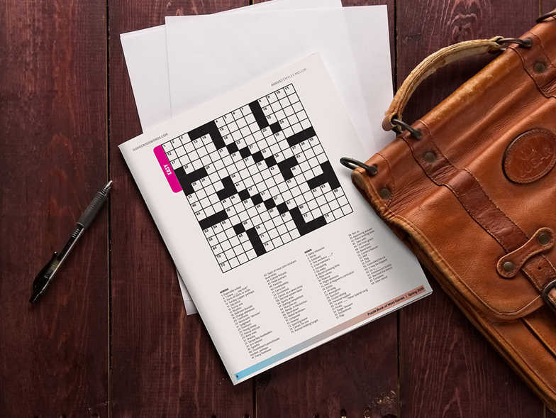 crossword puzzle on a wooden table