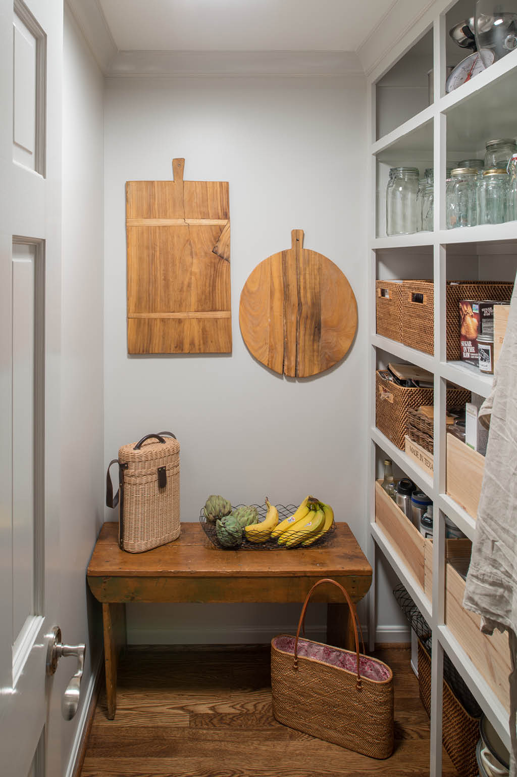 kitchen pantry with wooden bench