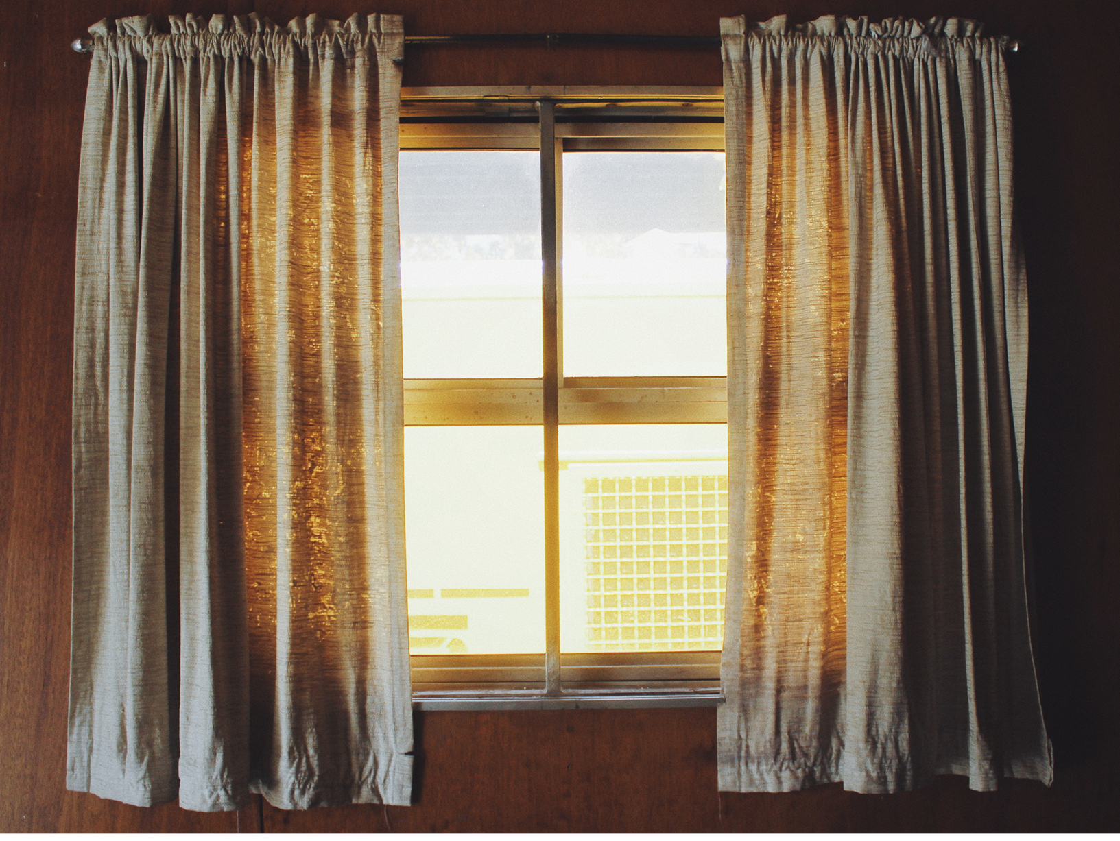 light coming through window with sheer curtains
