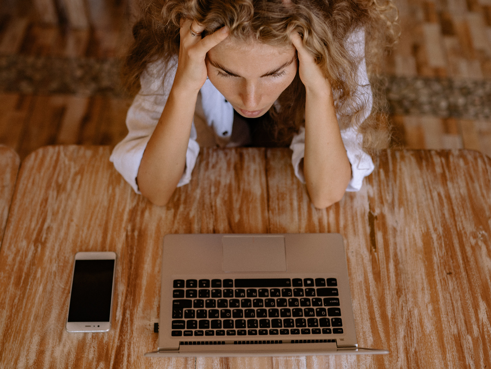 frustrated woman lookingat computer