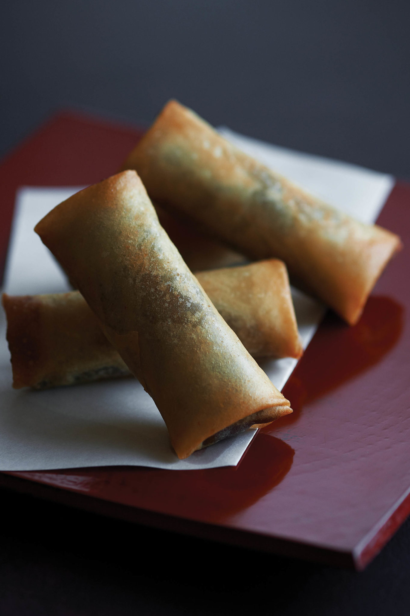 sweet spring rolls on red plate