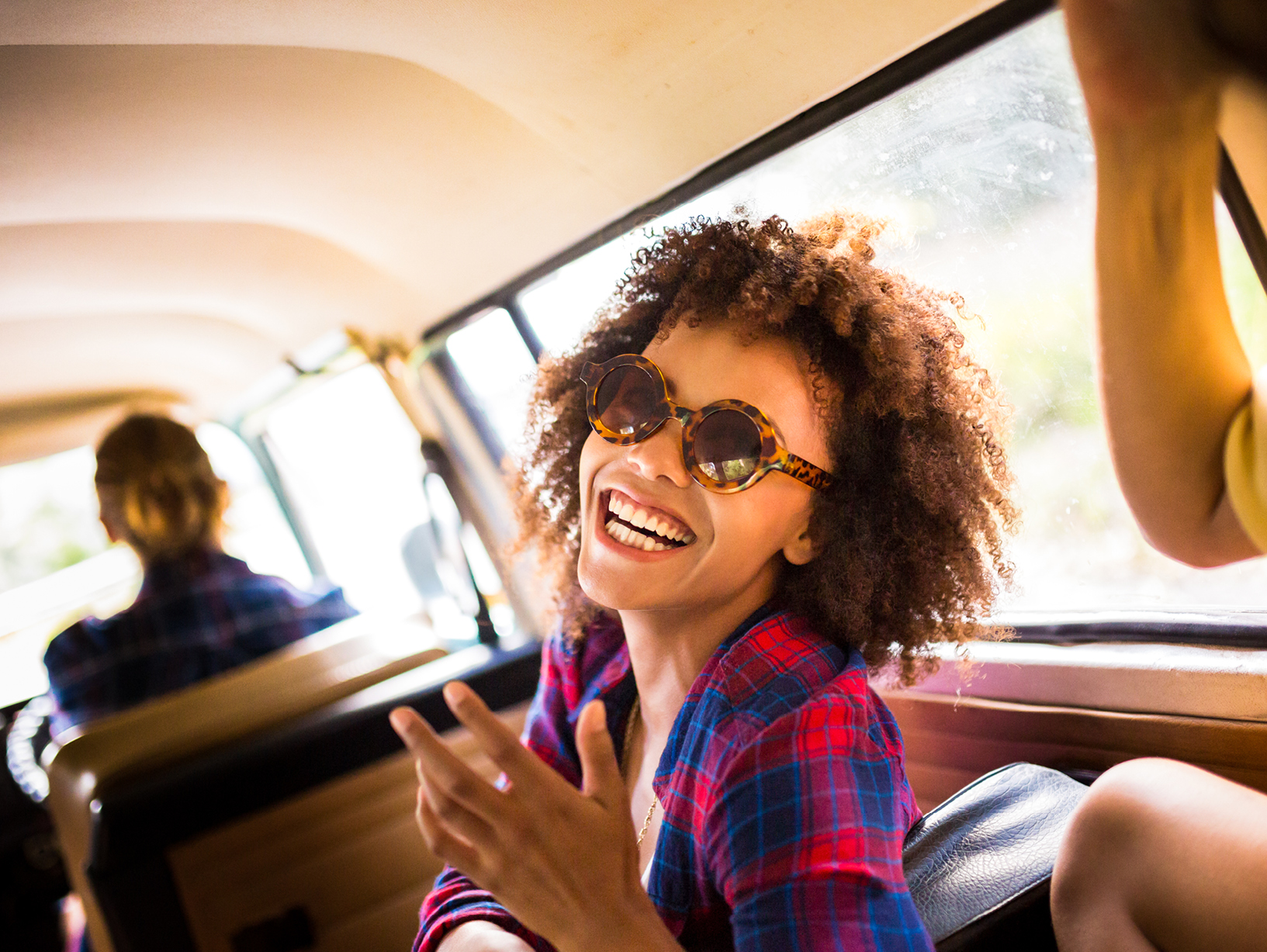 person smiling during RV roadtrip