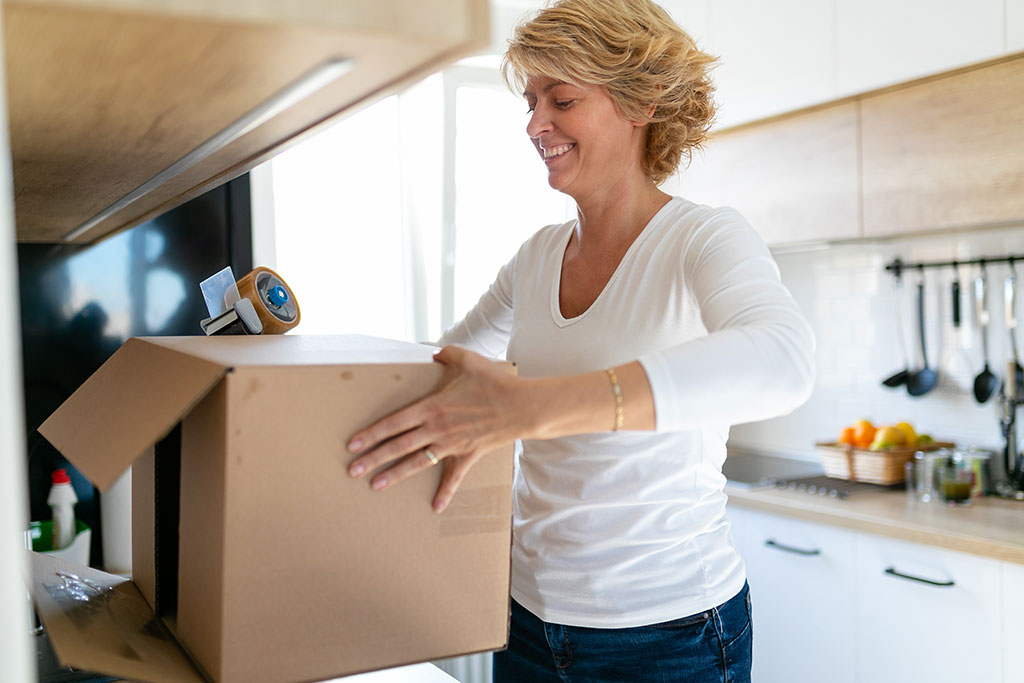 Woman packing a box