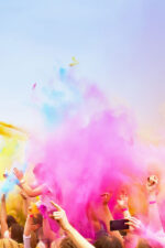 Holi festival. people throwing colored powder everywhere to celebrate
