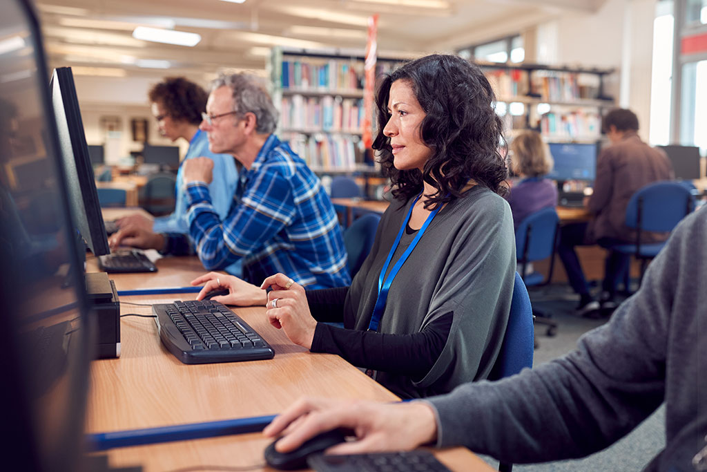 People using library computers