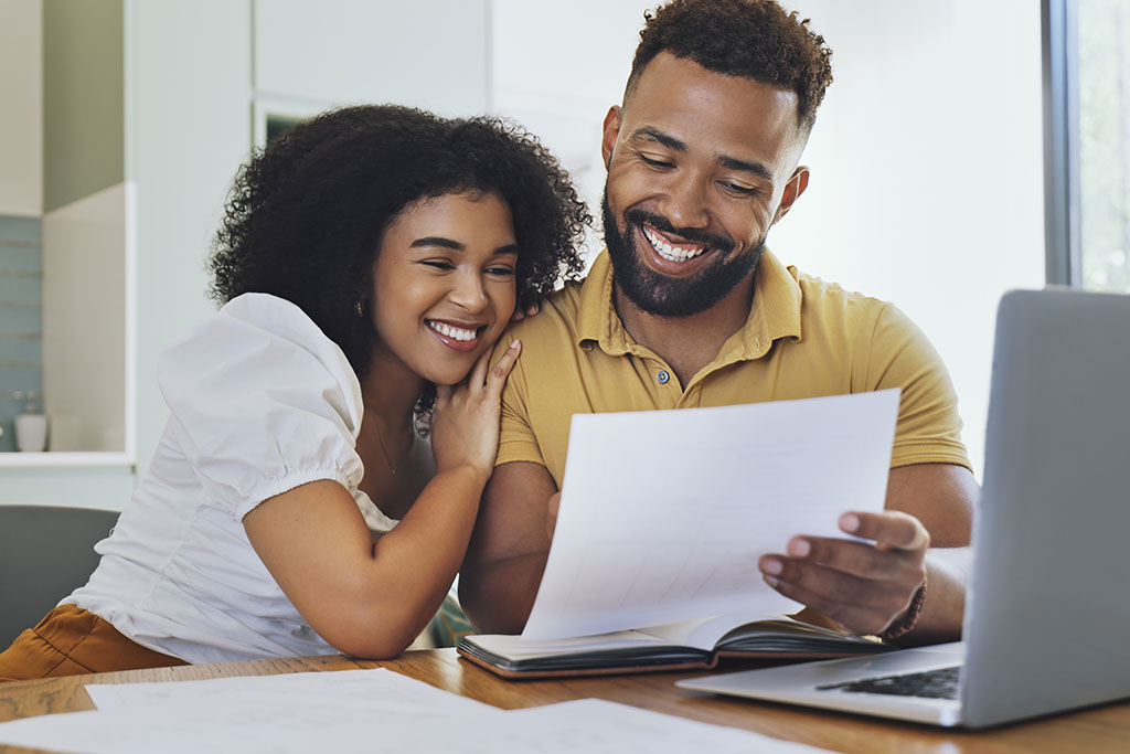 Couple looking over papers