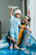 Dad and son in airport