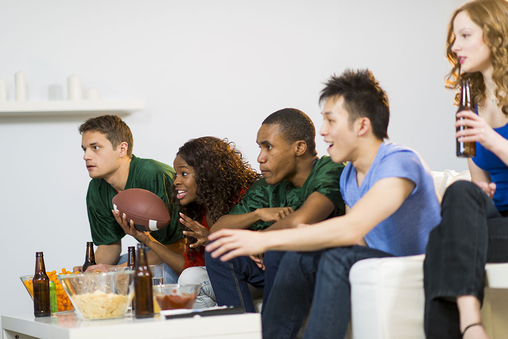 People watching football