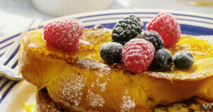 Ricky’s Cinnamon and Vanilla Challah French Toast Served with Fresh Berries